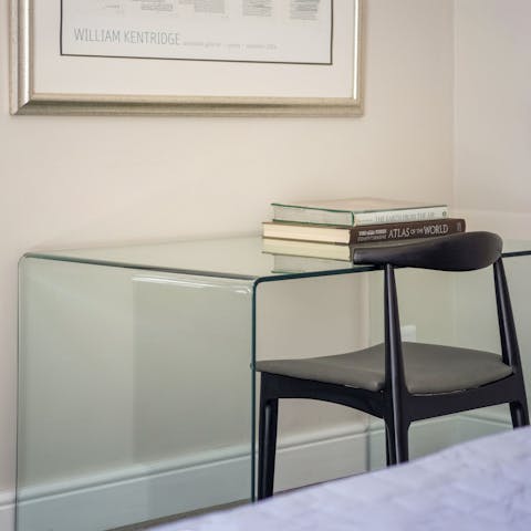 Get some work done at classy laptop-friendly desks in each bedroom