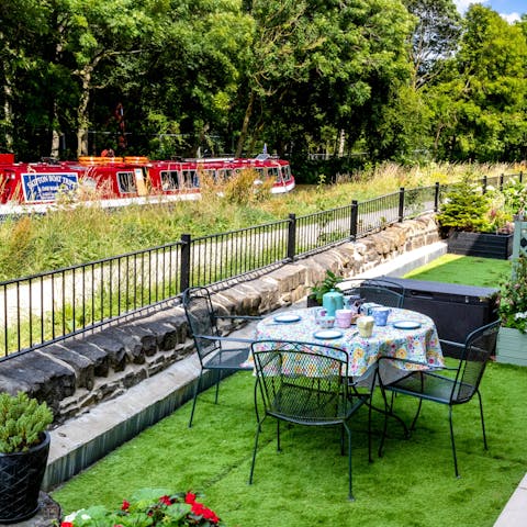 Enjoy some waterside afternoon tea in the garden