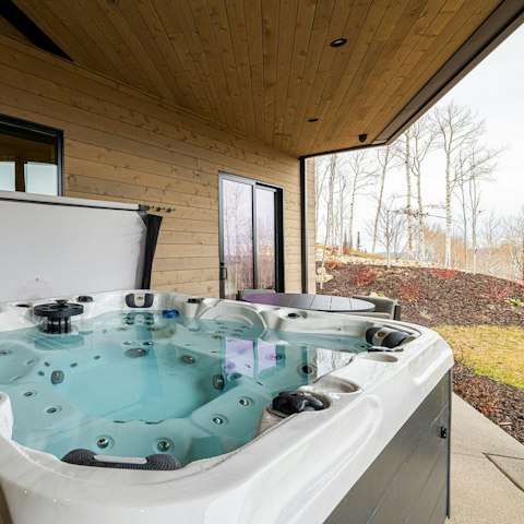 Embrace total relaxation while soaking in the hot tub