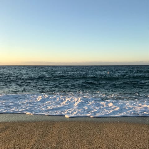 Stroll to the restaurant-lined Sunrise Beach for a walk along the sands