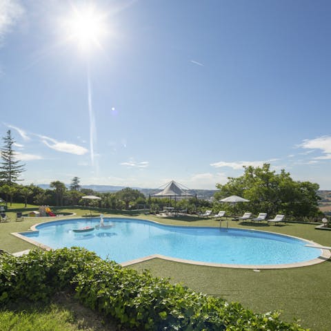 Enjoy the sunshine and far-reaching views from the private pool