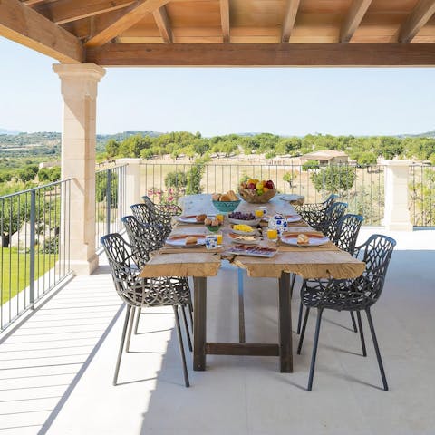 Savour the simple pleasures of drinks and delicious meals on the terrace