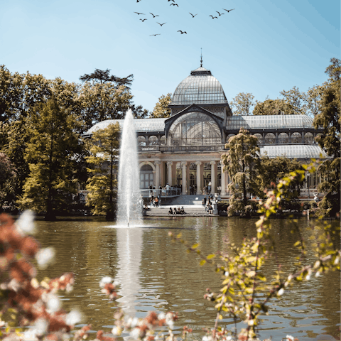 Have a stroll around the lake at pretty El Retiro Park, a ten-minute walk away