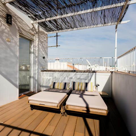 Spend sunny days lounging on the roof terrace