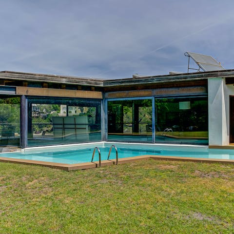 Cool off from the Catalan sun in the pool with its waterfall feature