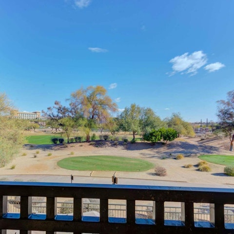 Enjoy views of the 9th hole from the private balcony