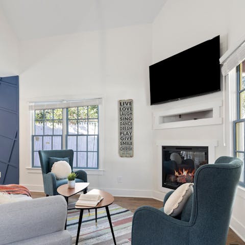 Get cosy and enjoy a movie night by the fireplace