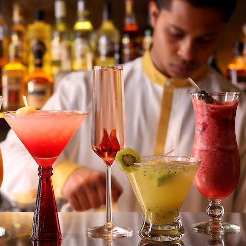 Enjoy a drink at the Q Bar