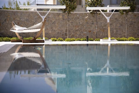 Sun yourself by the pool, or take a swing in the hammock — if there's a better way to relax, we've not heard of it