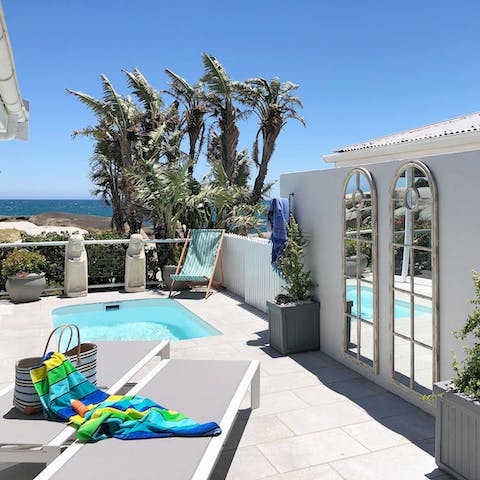 Laze on loungers in the sun before taking the plunge in your private pool