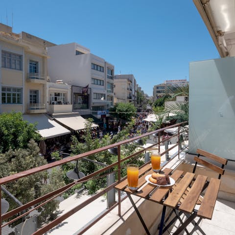 Retreat to the balcony for a spot of breakfast & a cooling glass of orange juice with a view