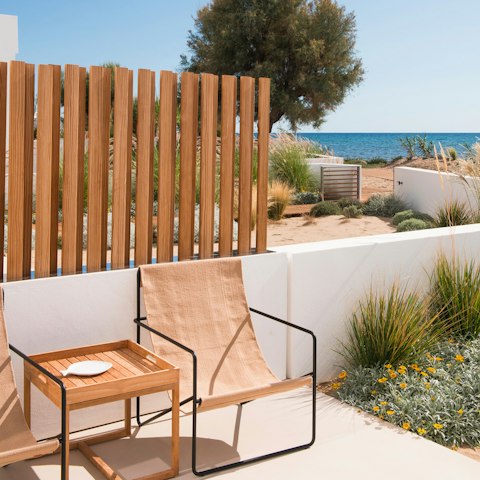 Sip local wine as you admire sea views