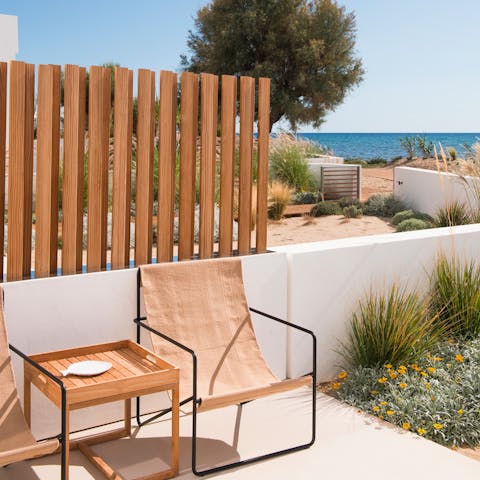 Sip local wine as you admire sea views