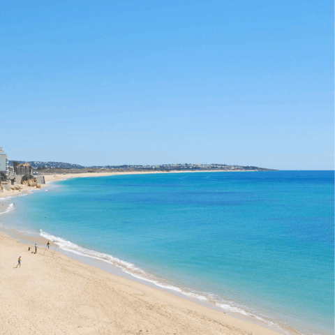 Pack a beach bag and embrace the waves in Armação de Pêra