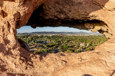 Wander Papago Park's striking red-rock buttes and iconic Hole-in-the-Rock formation, about seventeen-minutes by car