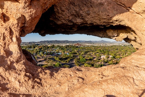 Wander Papago Park's striking red-rock buttes and iconic Hole-in-the-Rock formation, about seventeen-minutes by car