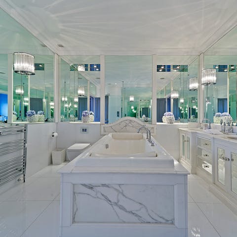 Relax and unwind with a long soak in the freestanding bathtub