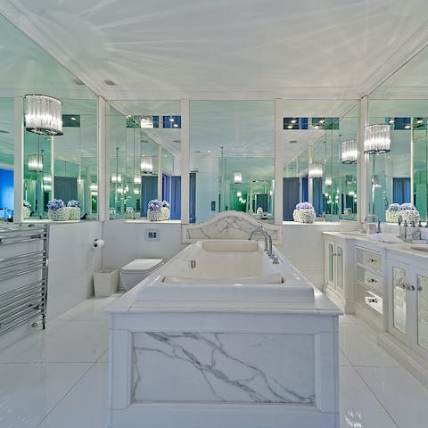 Relax and unwind with a long soak in the freestanding bathtub