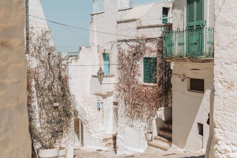 Explore Ostuni's whitewashed old town perched dramatically on a hilltop, a fourteen-minute drive