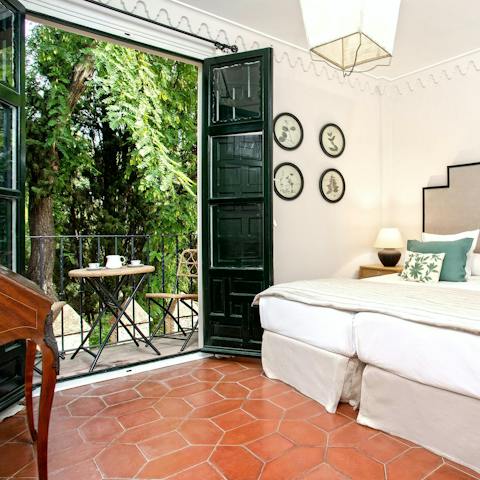 Slip from your bedroom and onto the balcony for a morning coffee