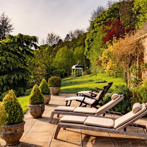 Enjoy idyllic garden views while relaxing on the terrace