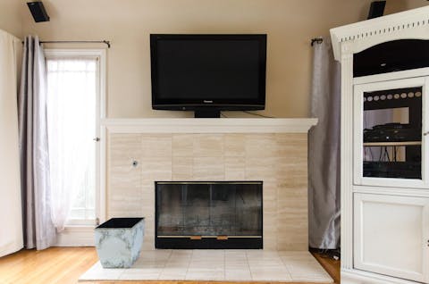 Cuddle up in front of the fireplace on rare cooler evenings