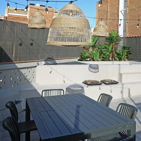 Gather around the alfresco dining area for an authentic Catalan feast