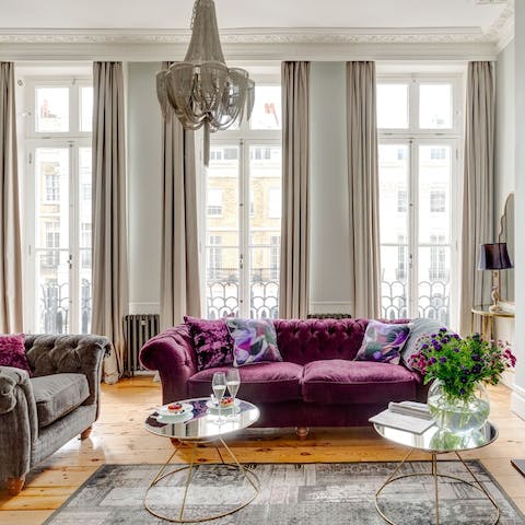 Relax with a glass of bubbly in the regally decorated drawing room