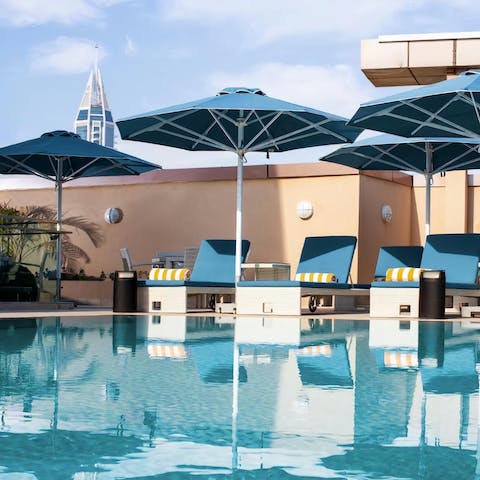 Take a refreshing dip in the swimming pool