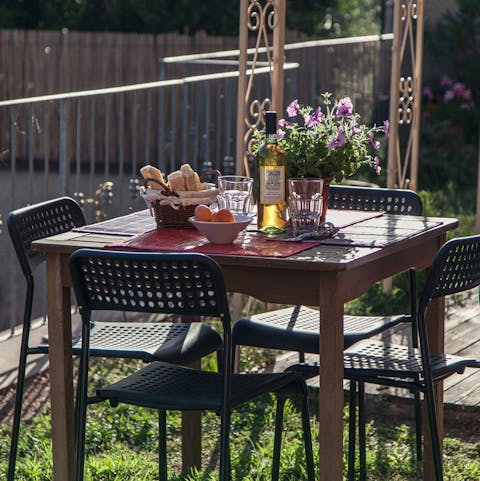 Enjoy a glass of Italian wine in the shared garden