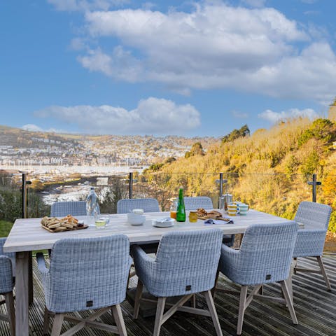 Savour drinks and incredible views across Kingswear