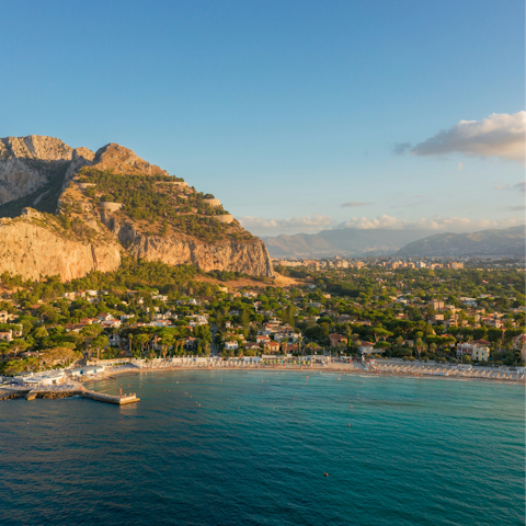 Enjoy a beach day in Mondello, a thirty-minute drive away