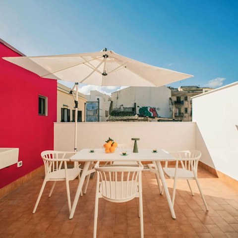 Savour the Sicilian sunshine from the private terrace