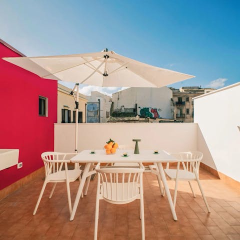 Savour the Sicilian sunshine from the private terrace