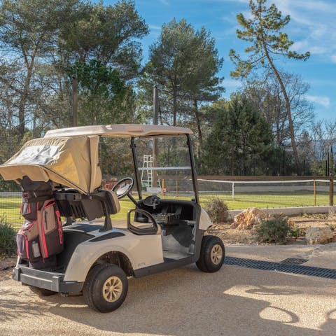 Use the buggy provided to reach the resort's golf course