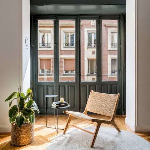 Soak up some rays with a good book by the Juliet balcony