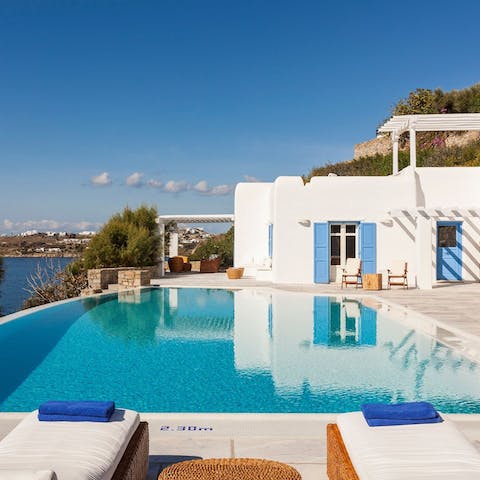 While away the afternoons outside, swimming in the pool and lounging in the sun