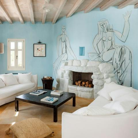 Fall in love with the Cycladic charm and interesting artwork inside