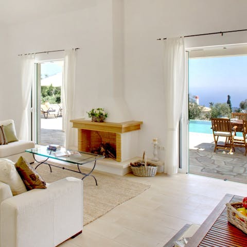 Choose between a crackling fire or French doors wide open to let in the sun