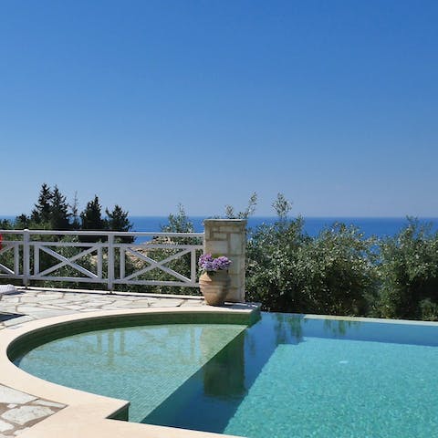 Slip into the infinity pool and float beneath a near-constant blue sky