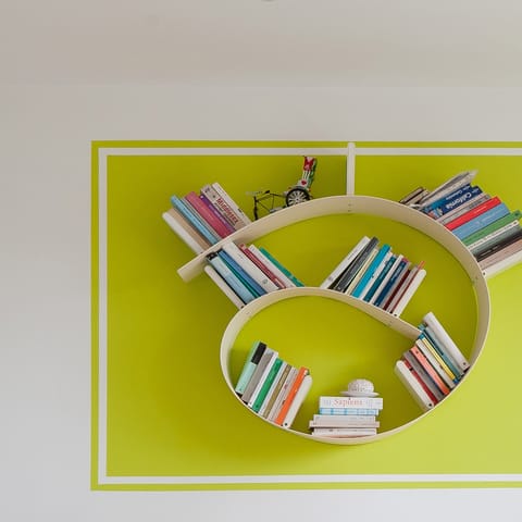Relax with a book from this home's collection