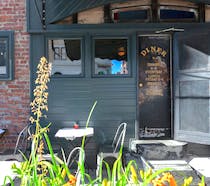 Kick back at Diner for bites directly under the Williamsburg Bridge