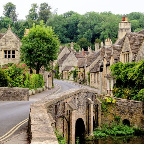 Explore the rolling hills and medieval villages of the Cotswolds
