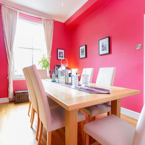Gather together in the red dining room for a celebratory meal
