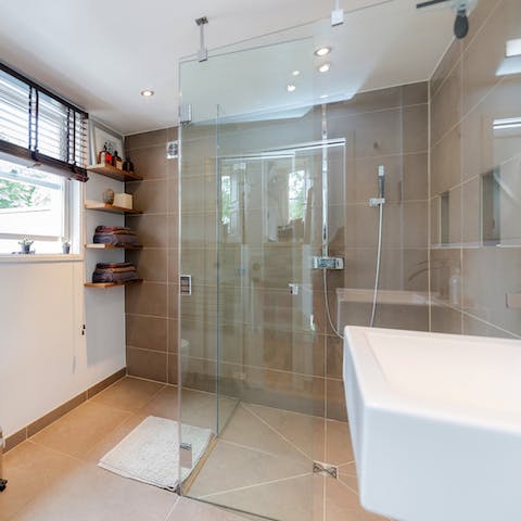 Pamper yourself in the large, luxurious bathroom