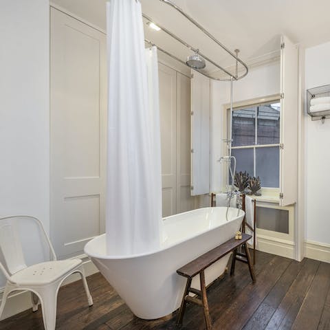 Enjoy a refreshing soak in the freestanding bathtub here