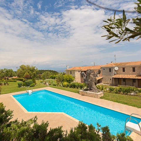 Cool off from the heat of the day in the shared swimming pool