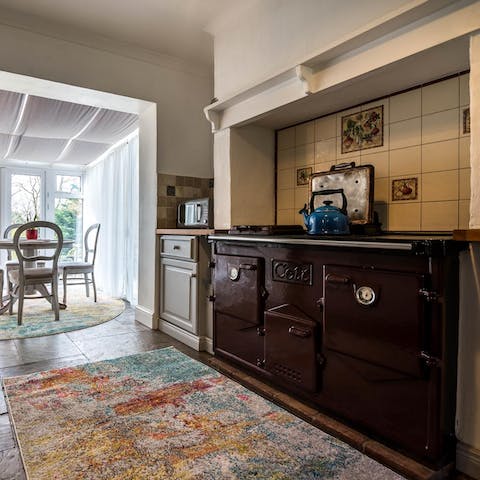Rustle up a family feast on the AGA-style stove in the kitchen