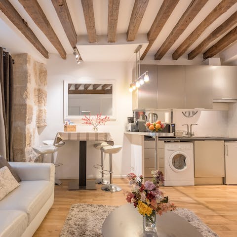 Start mornings off with fresh coffee and croissants at the chic breakfast bar