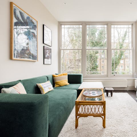 Enjoy the natural sunlight bathing the main living space during the daytime as you relax on the sofa
